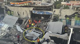 rescue-workers-search-survivors-jet-102056295.jpg